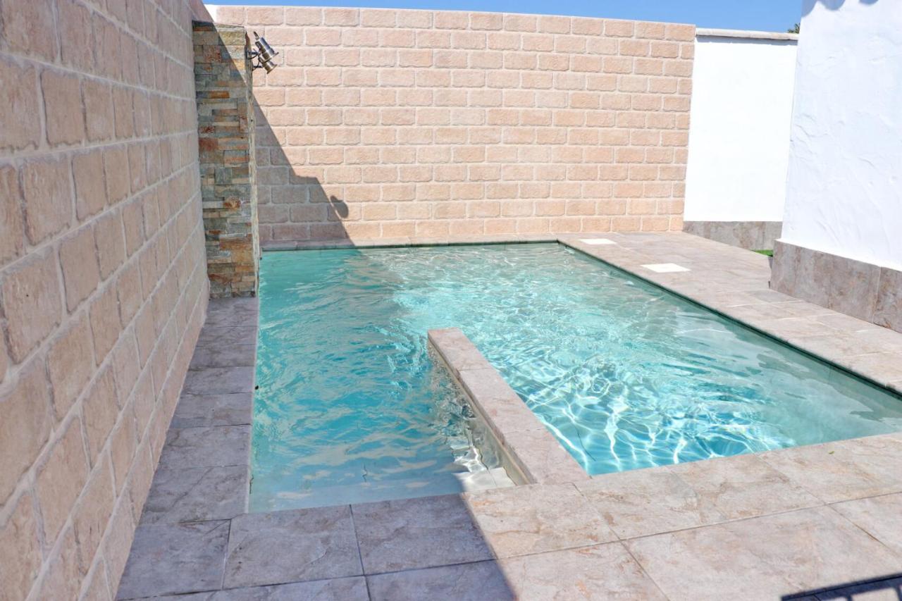 Bungalow La Roa con piscina comunitaria y privada Conil De La Frontera Exterior foto