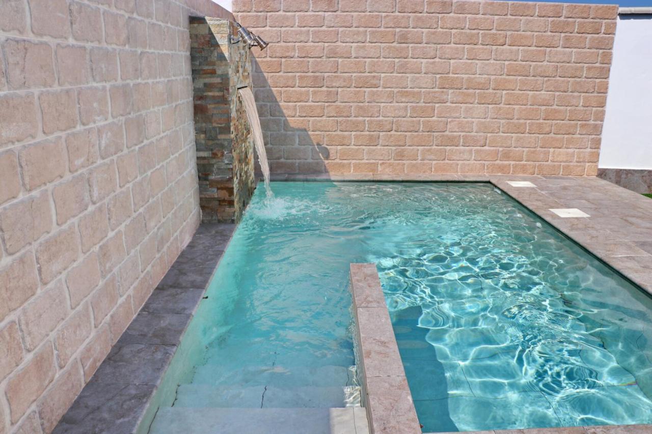 Bungalow La Roa con piscina comunitaria y privada Conil De La Frontera Exterior foto